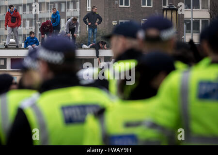 Port of Dover, Kent, UK. 2nd April, 2016. Locals of Dover watch far-right and British nationalist groups march and rally though their home town in a heavily policed protest against on-going migration and refugee seekers to UK Credit:  Guy Corbishley/Alamy Live News Stock Photo