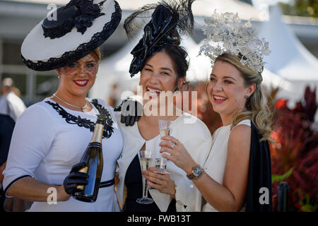 Sydney, Australia. 02nd Apr, 2016. Women enjoy the atmosphere at the Myer Fashions on the Field competition at Royal Randwick, The Championships Day when racegoers dress in monochromatic ensembles to impress and compete for the track's best dressed men and women and a piece of the $60,000 prize pool. © Hugh Peterswald/Pacific Press/Alamy Live News Stock Photo