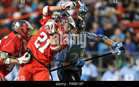 Piscataway, NJ, USA. 2nd Apr, 2016. Christian Mazzone (21) and Robert Kuhn (28) tangle during an NCAA Lacrosse game between the Johns Hopkins Blue Jays and the Rutgers Scarlet Knights at High Point Solutions Stadium in Piscataway, NJ. Rutgers defeated Johns Hopkins 16-9. Mike Langish/Cal Sport Media. © csm/Alamy Live News Stock Photo