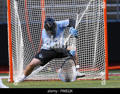 Piscataway, NJ, USA. 2nd Apr, 2016. Johns Hopkins goalkeeper Brock Turnbaugh (29) makes a save during an NCAA Lacrosse game between the Johns Hopkins Blue Jays and the Rutgers Scarlet Knights at High Point Solutions Stadium in Piscataway, NJ. Rutgers defeated Johns Hopkins, 16-9. Mike Langish/Cal Sport Media. © csm/Alamy Live News Stock Photo