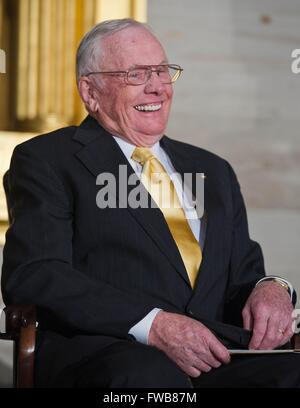 Apollo 11 astronaut Neil Armstrong, the first man to walk on the Moon, laughs at a remark made during a Congressional Gold Medal ceremony honoring astronauts Michael Collins, Buzz Aldrin, John Glenn and Armstrong in the Rotunda at the US Capitol November 16, 2011 in Washington, DC. Stock Photo