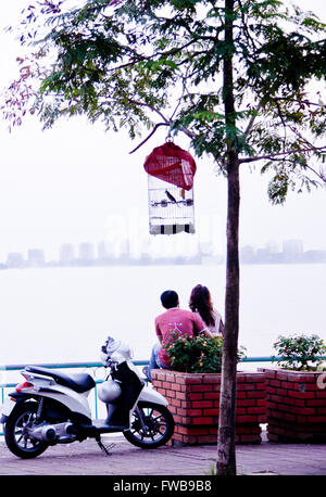 Motorbike and View of Tay Ho (West Lake) in Hanoi, Vietnam Stock Photo