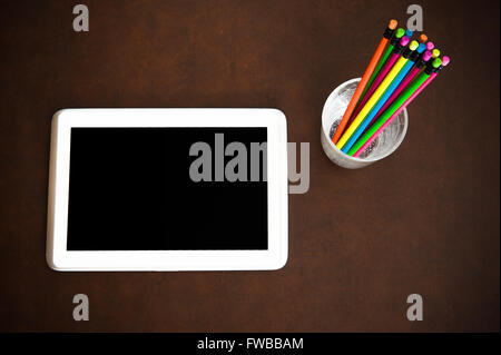 Writer desktop symbol with empty cover books and colorful pencils on wood Stock Photo