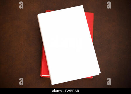 Books on wooden desktop with empty cover white copy space Stock Photo