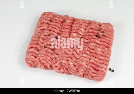 raw minced  meat with onion and rosemary Stock Photo