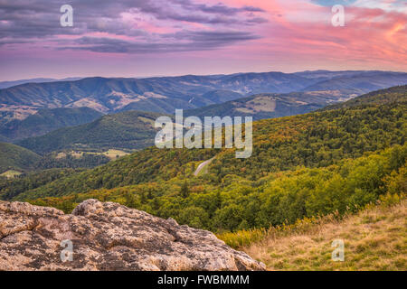 Twilight begins to settle over the gently rolling hills and mountains from atop Spruce Knob in West Virginia. Stock Photo