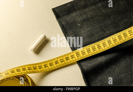 still life with a tape measure a chalk and tissue Stock Photo