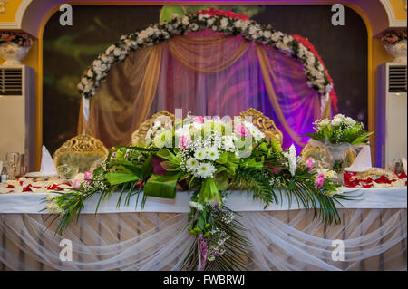 Wedding table decoration with flowers Stock Photo