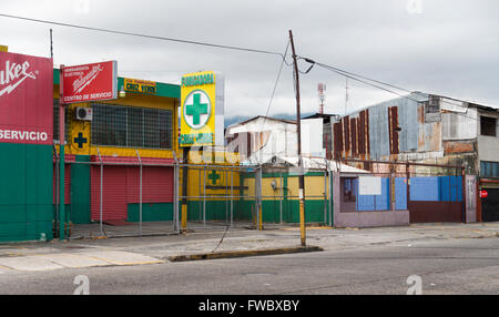 'Fumigadora Cruz Verde' a pest control business storefront in a rough neighbourhood in San José, San José Province, Costa Rica. Stock Photo