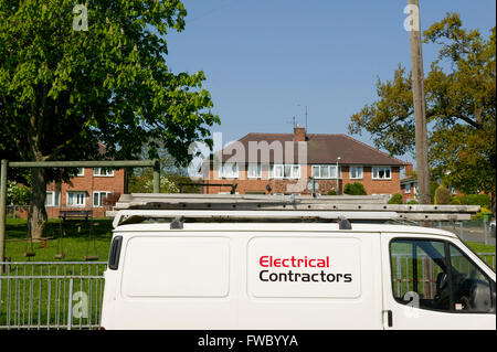 An Electrical Contractor's van parked on a typical housing estate after being called out to do some repair work. Stock Photo