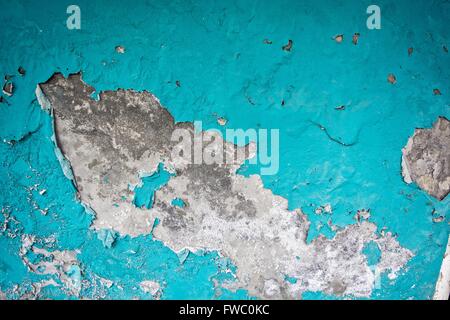 Old house wall with damaged paint. Stock Photo