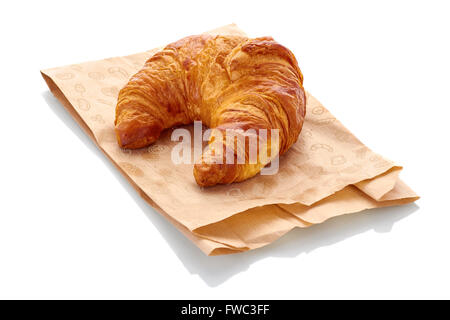 fresh croissant with paper bag on white background Stock Photo