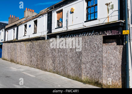 Boarded up restaurant, closed down after it was destroyed by a major fire Stock Photo