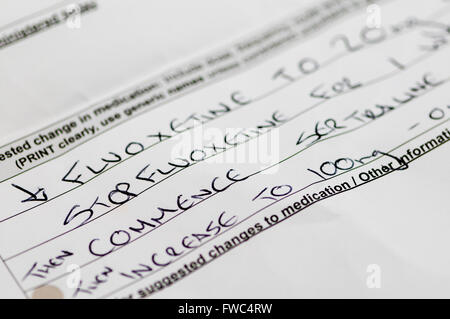 Doctor's instructions to change SSRI antidepressant medication from Fluoxetine to Sertroline on a medical form. Stock Photo