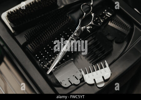 Professional hairdresser tools on table Stock Photo