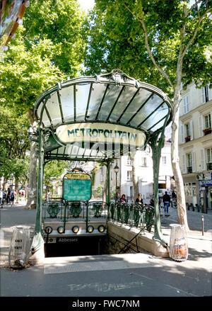 A conserved canopied Art Nouveau metro entrance designed by Hector Guimard, Place des Abbesses, Montmartre, Paris, France.