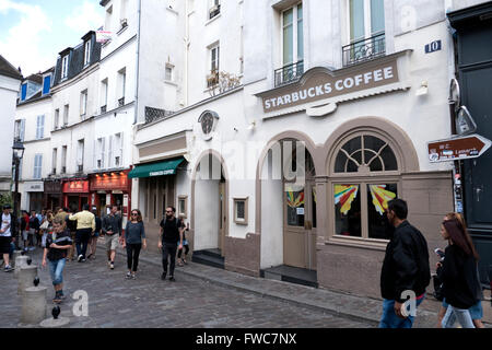 Starbucks Coffee opens in the ancient Montmartre, Paris, France. Stock Photo