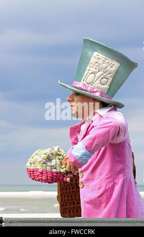 The Mad Hatter from Alice in Wonderland and  through the looking glass on Cromer pier Norfolk England Stock Photo