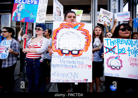 Hollywood, CALIFORNIA, USA. 3rd Apr, 2016. Supporters of democratic presidential candidate BERNIE SANDERS stage a demonstration in front of CNN headquarters in Hollywood, Calif. They claim that their candidate does not get equal coverage on CNN or any other network news station. Credit:  Gabriel Romero/ZUMA Wire/Alamy Live News Stock Photo
