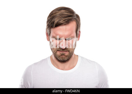 Stressful young man isolated on white background. Stock Photo