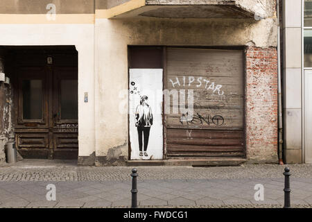 BERLIN, MARCH 24: Street art by XOOOOX in Mitte, Berlin on March 24, 2016. Stock Photo