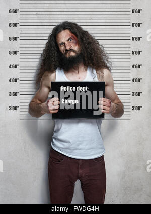 Funny portrait of a skinny hardened criminal Stock Photo