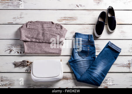 Jeans with sweatshirt and shoes. Stock Photo