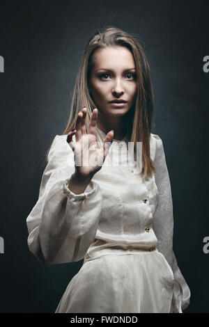 Pale beautiful woman with sad expression . Melancholy Stock Photo