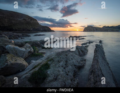 A view along the ledges at Lulworth Cove in Dorset. Stock Photo