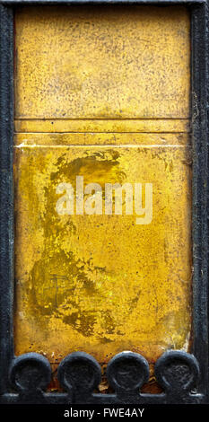 Gold colored chipped wall background Stock Photo