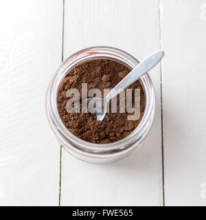 Ground coffee in glass jar, from above Stock Photo