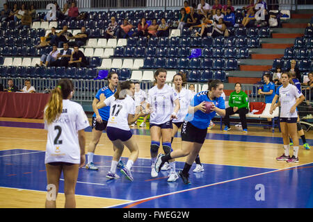 young women handball match held in a sports centre Stock Photo