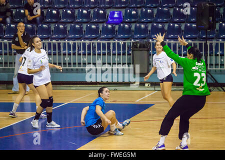 young women handball match held in a sports centre Stock Photo