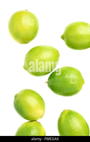 Surface covered with multiple ripe limes, composition isolated over the ...
