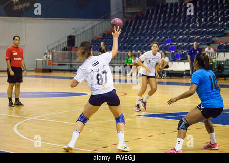 young women handball match held in a sports centre Stock Photo