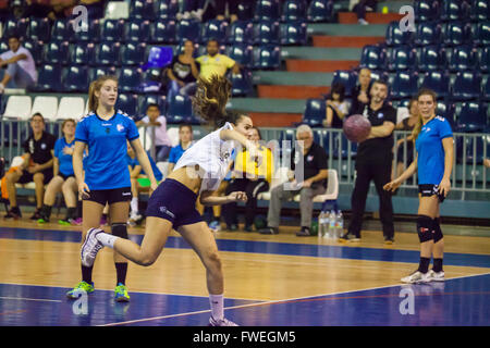 young women handball match held in a sports centre Stock Photo