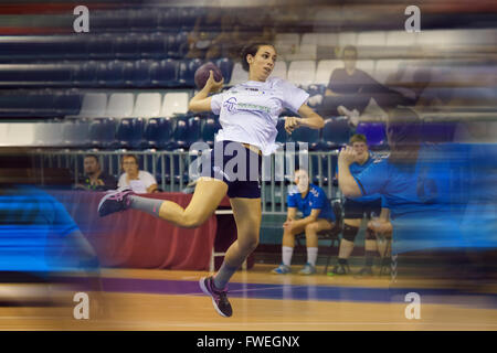 young women handball match held in a sports centre Stock Photo