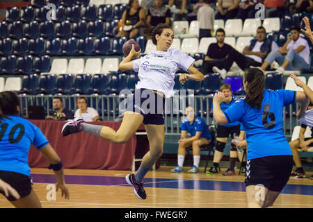 young women handball match held in a sports centre Stock Photo