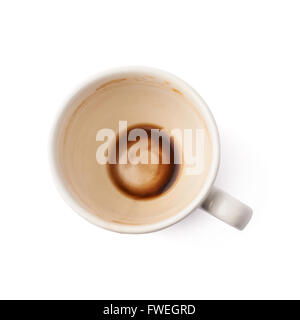 Used empty cup of coffee isolated Stock Photo