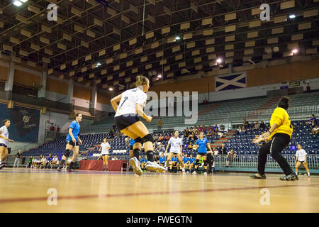 young women handball match held in a sports centre Stock Photo