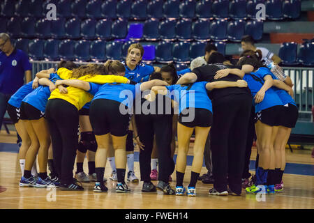 young women handball match held in a sports centre Stock Photo