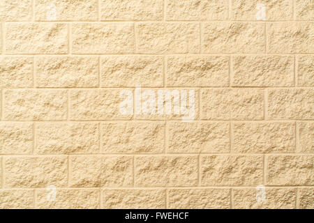 Cream painted block brick wall for background Stock Photo