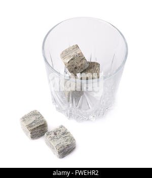 Empty tumbler filled with stones Stock Photo
