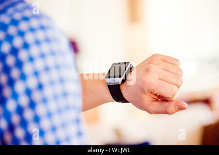 Close up of unrecognizable man using smart watch Stock Photo