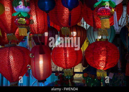 Chinese red lanterns on sale in one of the narrow streets in Chinatown in Singapore.  Chinese lanterns symbolize Chinese New Year and the Lantern Fest Stock Photo