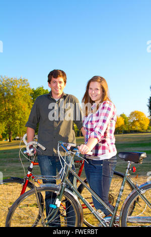 Beautiful couple kissing on bike hi-res stock photography and images - Alamy