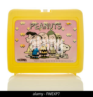 Winneconne, WI - 1April 2016: Plastic lunch box from the 1980's featuring Peanuts.  A famous comic strip containing characters   Stock Photo