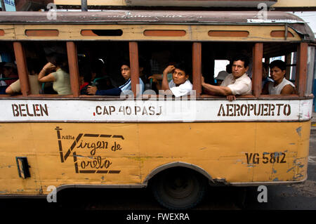 Small bus serving as public transportation in Iquitos, Loreto, Peru. Passenger bus covering the route between the airport and do Stock Photo