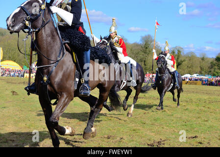 Some of the Household Cavalry  charging across the showgrounds during The Musical Ride of the Household Cavalry, Lambourn Open Day, Berkshire, UK Stock Photo