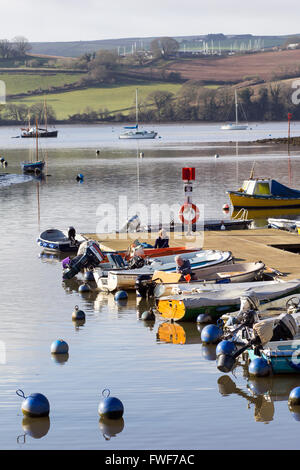 bailing out boats at stoke gabriel pontoon, River Dart estuary and the tranquil mill pond of  historic Stoke Gabriel village,  6 Stock Photo